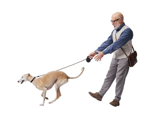 Mature man walking a disobedient dog