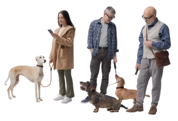Pet owners walking their dogs