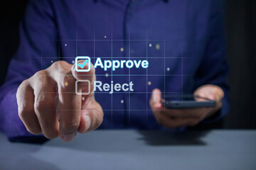 Man ticking a checkmark on a box on virtual screen to approve document or project