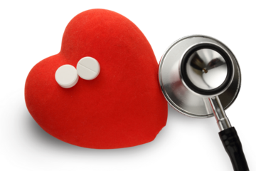 Red heart, stethoscope and pills