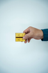 Gold bar stock photo, picture and photo on black table at night.