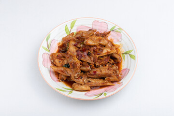 Chicken wings with bean sauce on a plate