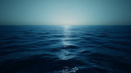 Fototapeta premium blue water surface, flat and blurred, in a dark blue, calm, with ripples