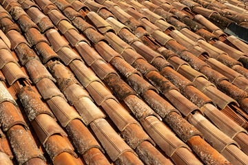 This is a closeup view showcasing a roof that has many tiles on it