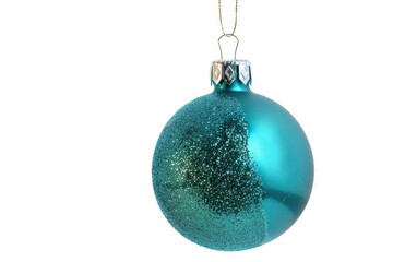 A blue Christmas ornament hangs from a gold chain, perfect for holiday decorating