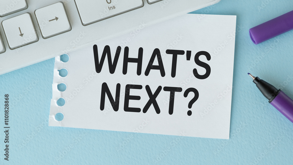 Poster what's next and business concepts with paper and accessories on table