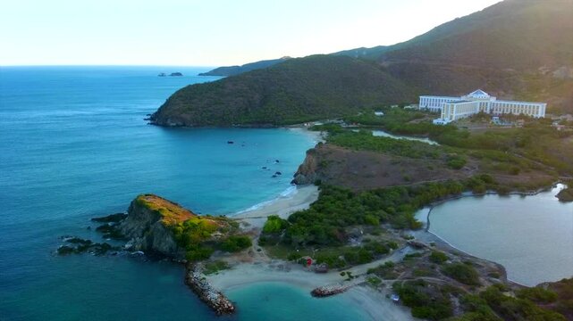 Panorama of Venezuela beach, lighthouse, pier and beautiful sandy beach at sunrise