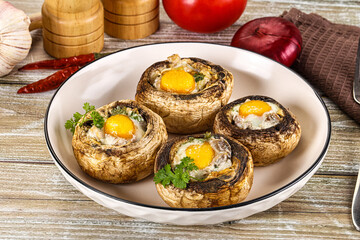 Baked champignon with quail egg
