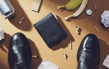 Lucky businessman finding a wallet on the floor