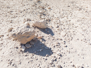 Background of stones on sand. Desert landscape. Alien view. Space surface. Day. Autumn. Egypt.