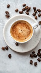Fototapeta premium Coffee in a white cup on a plate with coffee beans scattered on a table