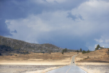 Road, hill or highway for travel, mountain route and peace in environment, location or adventure....