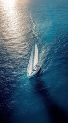 Sailing through azure waters among coastal reefs during a bright sunny day