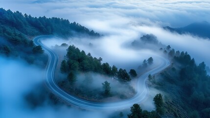 Obraz premium Winding mountain road aerial photography showcasing nature's majestic beauty