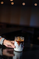 glass of coffee with milk on the table