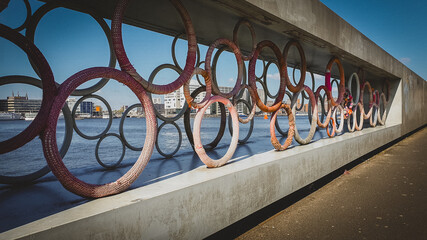 Decoratively designed bridge near the IJpromenade in Amsterdam