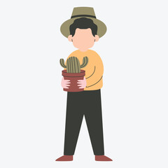 A person holding a potted cactus, wearing a hat and casual clothes.