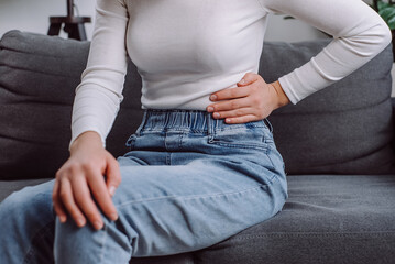 Flatulence young woman with pain stomach ache, suffer from food poisoning, abdominal pain and colon...