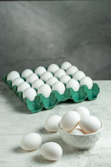 White eggs in cardboard box. Egg box.