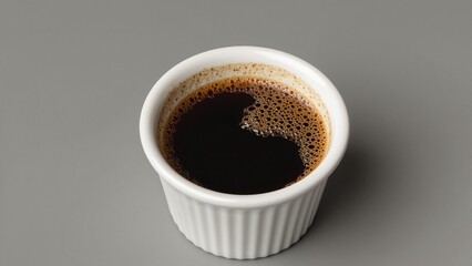Rich espresso shot in minimalist white cup with crema layer Ideal for caffeine boost