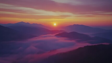 Fototapeta premium Majestic Sunrise Over Foggy Mountain Ranges