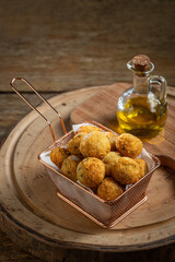 Codfish dumplings. fried dumpling, cod dumpling, fish meat, bacalao bunuelos.
