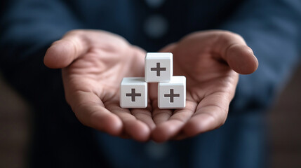 His open palm gesture and the blocks create a visual story about proactive health and life planning.