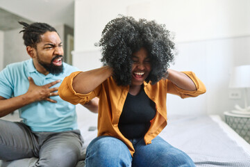 man problem conflict couple woman young wife divorce husband unhappy quarrel sad angry home...