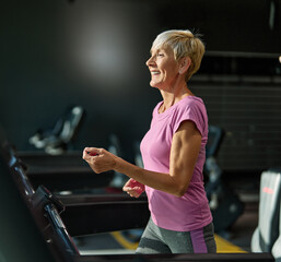 gym sport fitness exercise woman senior active treadmill training elderly running health healthy...
