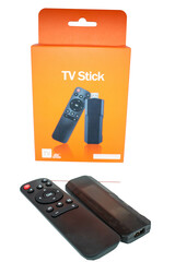 Remote control and TV stick next to product box without logo without brand ready to use in marketing selective focus, copy space