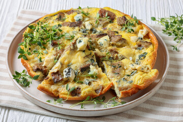 omelette with blue cheese, rye croutons and thyme