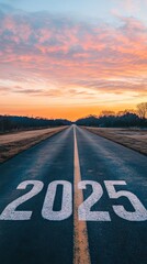Asphalt Road Leading Towards 2025: A New Year's Sunrise