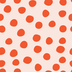 Red hand drawn polka dots on light background. Seamless pattern with dots for wrapping paper, fabric, scrapbooking.