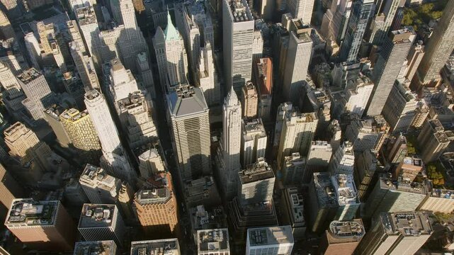 

Overhead Aerial Manhattan, Buildings in Financial District New York. Cityscape NYC High Quality Helicopter Footage. Urban life, modern life in USA. 