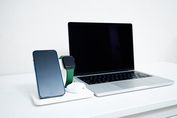 Wireless charging station for phone and watch