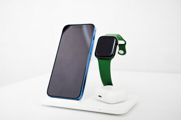 Wireless charging station for phone and watch