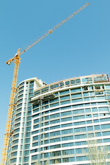 tower crane builds the house, nature