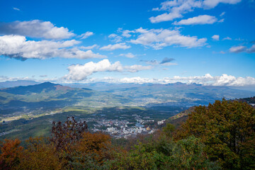 秋の榛名山 高根展望台から見る伊香保温泉と遠方の山々 群馬県渋川市