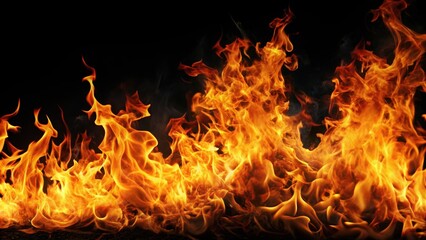 Flames of fire raging against a dark black background, flames, fire, heat, burning, energy, hot, bright, fierce