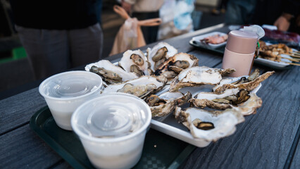 Seafood, oysters grilled, squid and scallop grilled, Matsushima fish market, Sendai, Japan, 21 October 2024. Japanese travel destination. freshness.