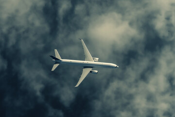 Obraz premium Airplane on clouds and sky. generative AI