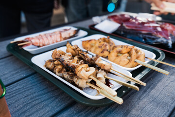 Seafood, oysters grilled, squid and scallop grilled, Matsushima fish market, Sendai, Japan, 21...