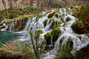 Obraz premium Nature’s symphony in full display. The breathtaking beauty of Huancaya Falls is like stepping into a dream. Nor Yauyos Lima Peru