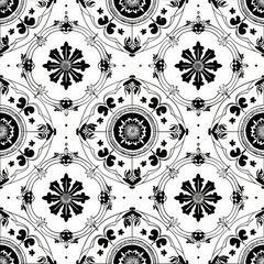 Elegant black and white tiled pattern featuring intricate floral designs and geometric shapes, perfect for various decorative applications