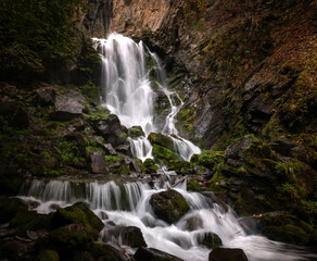 Mountain forest stream with waterfall in the Caucasus, Russia