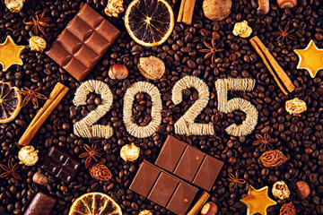 Numbers 2025 on a background of coffee beans, dark and milk chocolate pieces, cinnamon, dried...