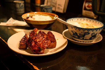Beef tongue steak grilled serve with rice and vegetable, Sendai beef steak, tender, Local food in Sendai Japan, travel destinations meal. Japanese restaurant menu cookery.