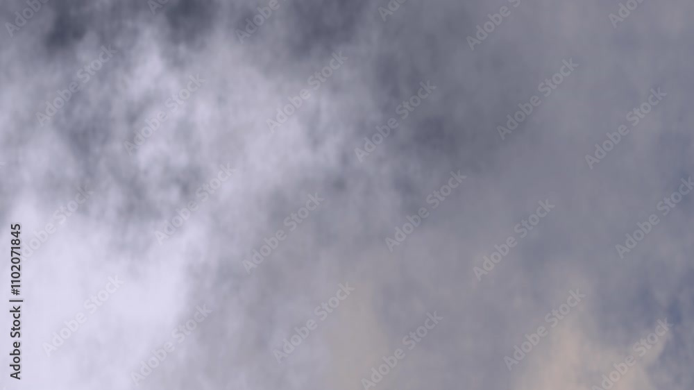 Poster 4k animated background mimicking a cloudy gray and white sky with soft dynamic textures. ideal for w