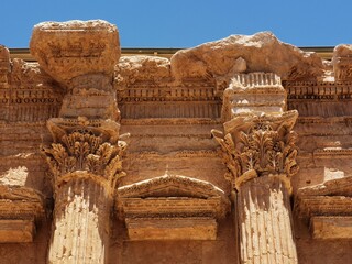 Baalbek is a large archaeological complex encompassing the ruins of an ancient Roman town in...