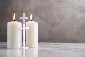 religious ceremonies, lighted white candles on a marble altar with pristine white cloth and orthodox cross in the backdrop